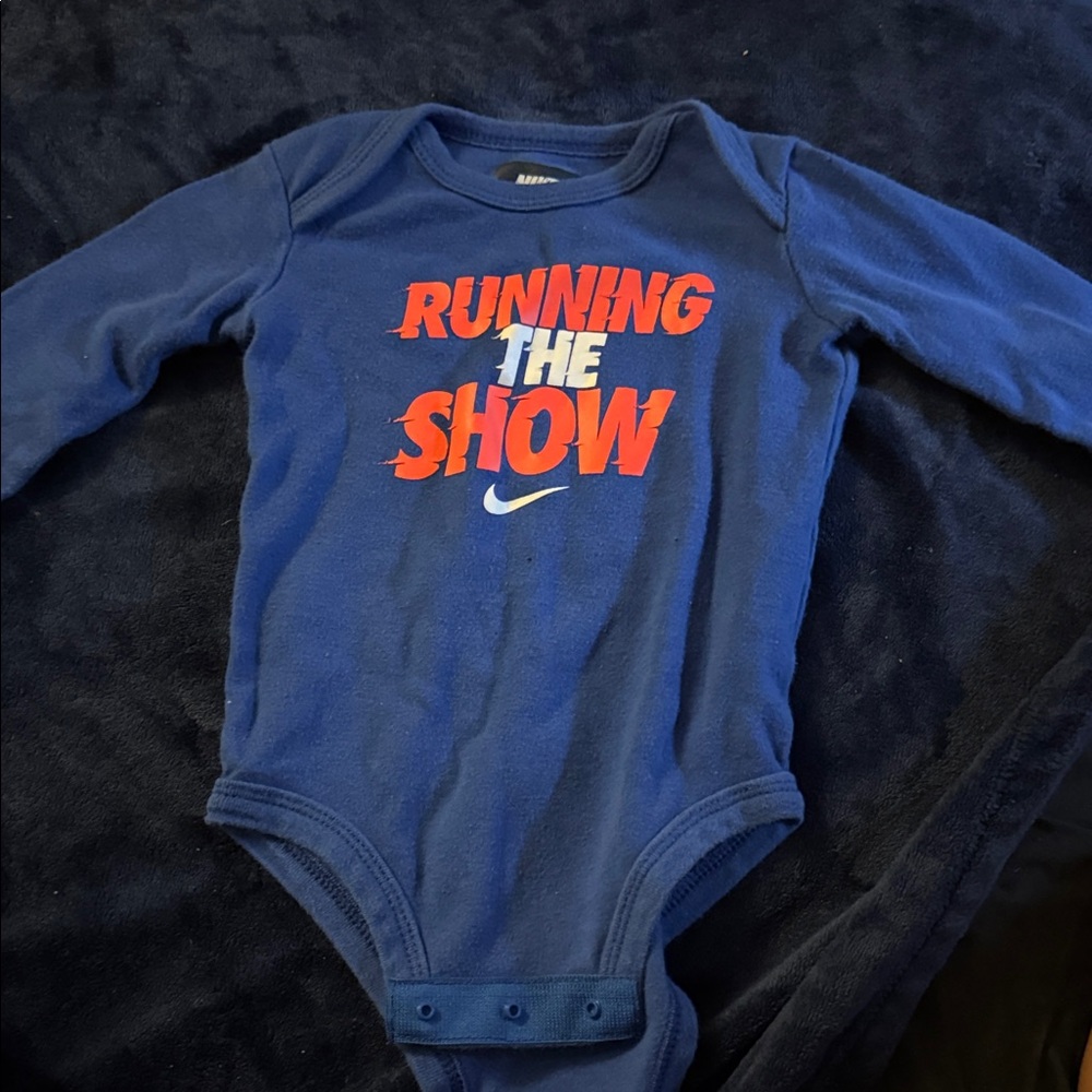 Nike Kids Bodysuit in Blue with Red Print
